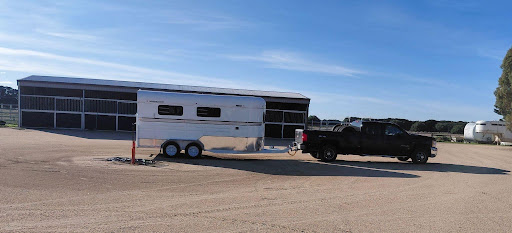 Horse float trailer beside a stable in Australia, representing horse float finance companies nationwide.